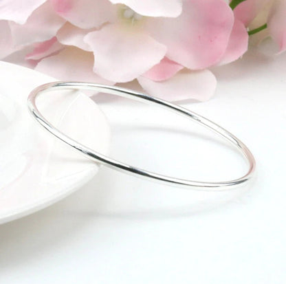 open glassy bracelet . KK Labib