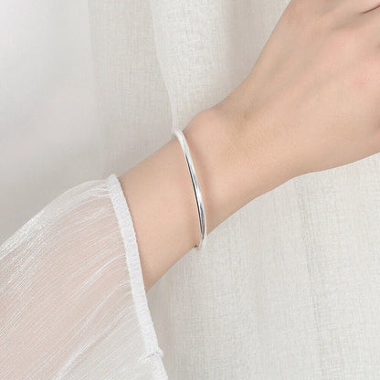 open glassy bracelet . KK Labib